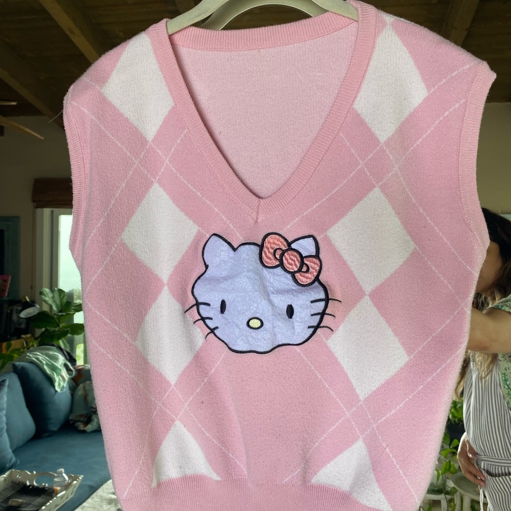 Hello Kitty pink vest size small (all tags removed: has been worn and washed)
